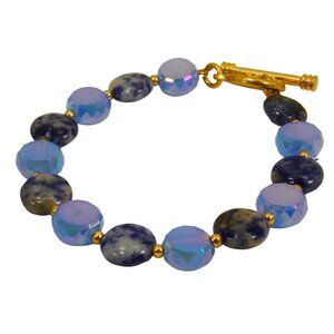 Blue bracelet with blue sodalite stone, blue glass beads, and small gold accents